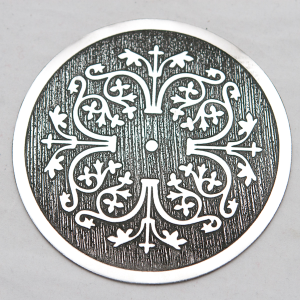 Round example of etching at the stainless steel