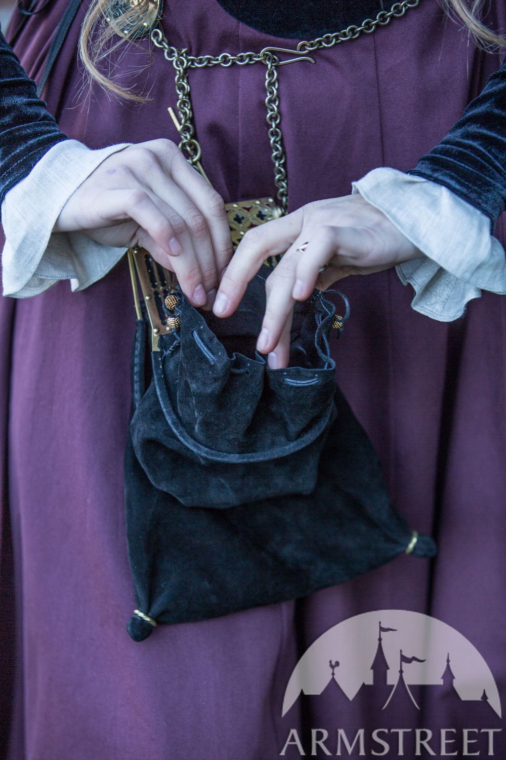 “Renaissance Memories” suede bag with brass frame