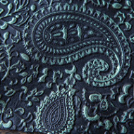 Green on black embossed leather 