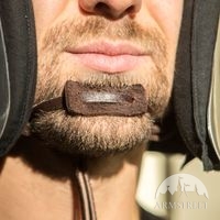 Chin strap with a drawstring and toggle